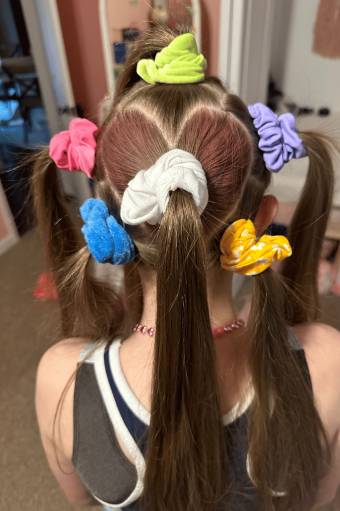 Loving this combo bubble braid hairstyle!! 🩶Quick and easy for this busy  Monday! We added a little glitter to the bubbles for some ext... | Instagram