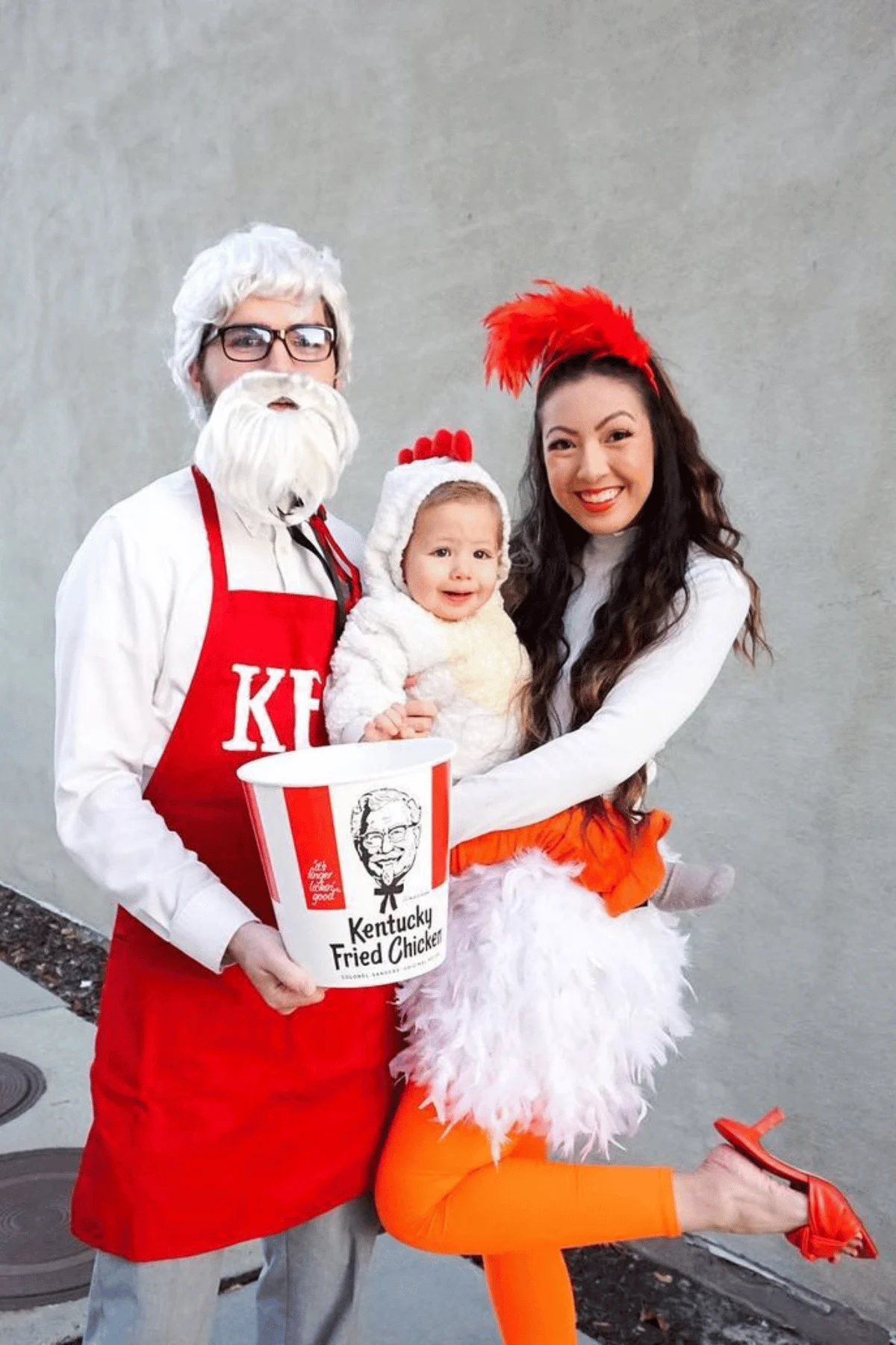 Father dressed as Colonel Sanders, mom and baby dressed as chickens