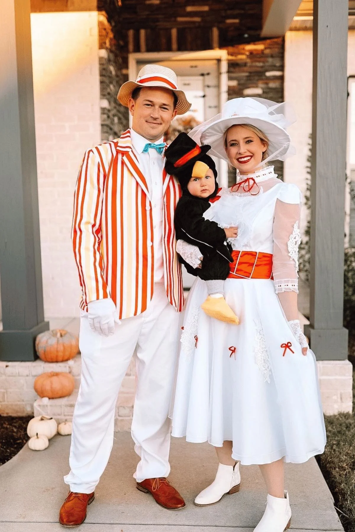 Mary Poppins costume with son dressed as a penguin