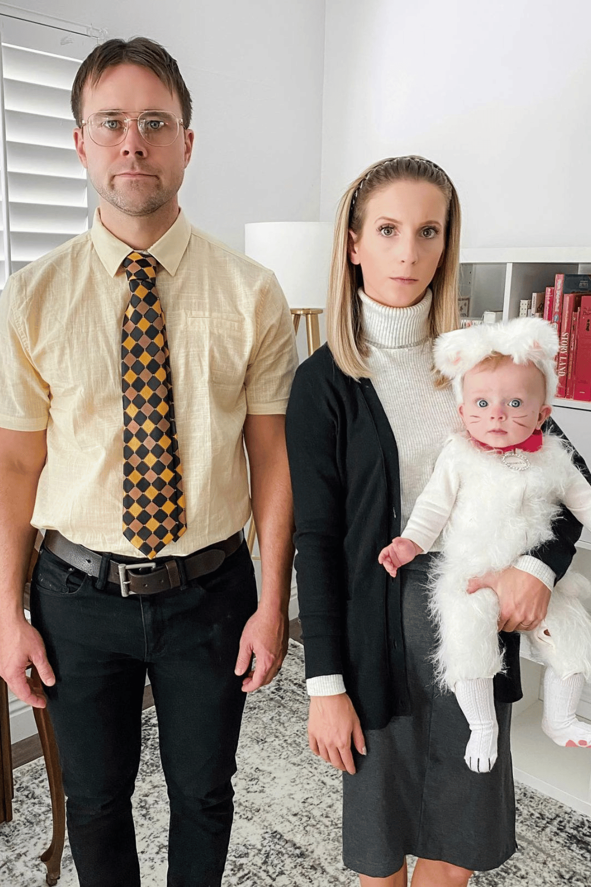 Dwight, Angela and baby dressed as Sprinkles the cat