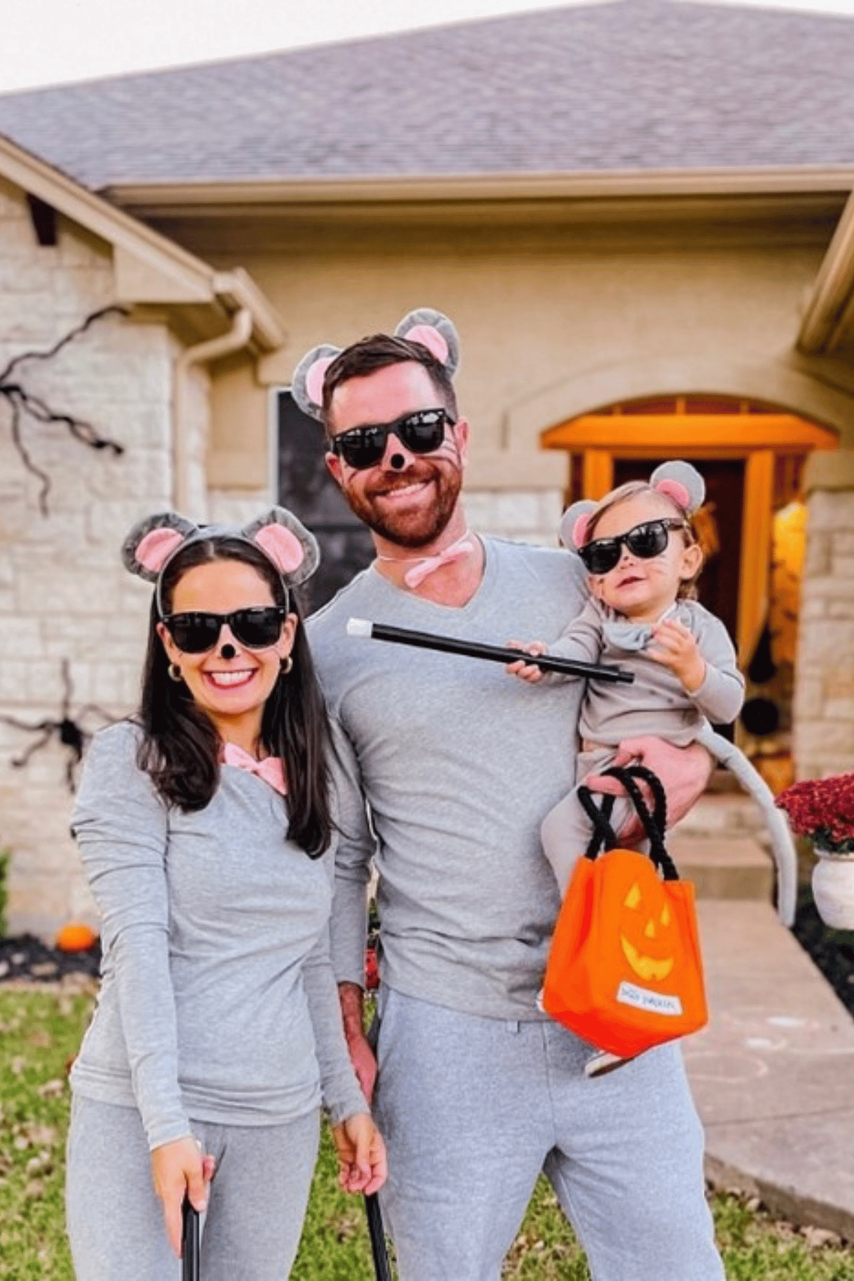 Family dressed as mice wearing sunglasses