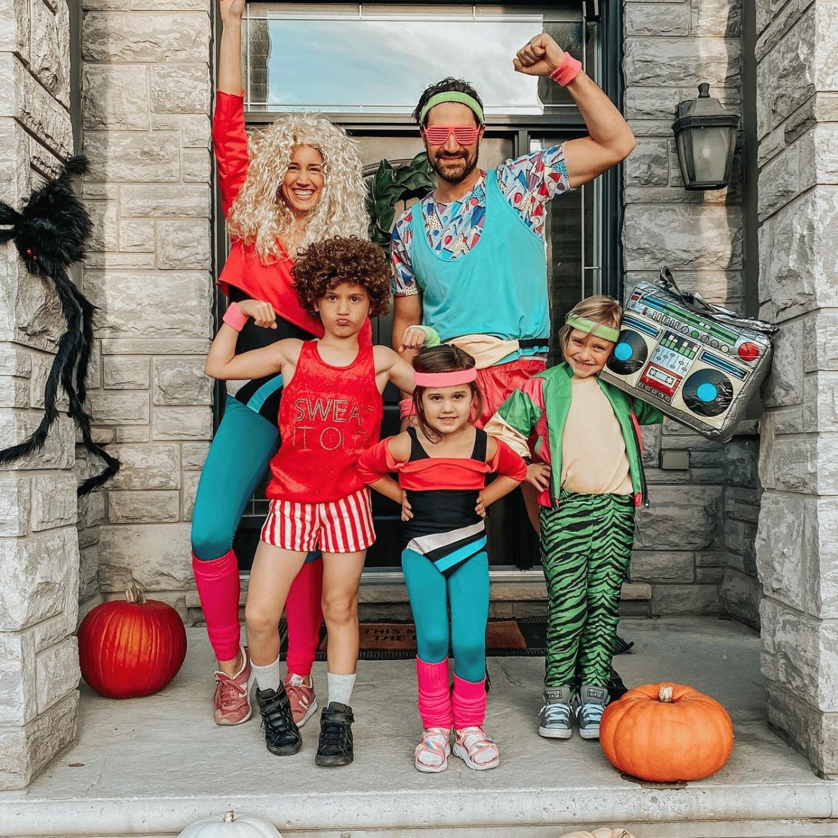 Family of 5 dressed in aerobic clothing from the 80s