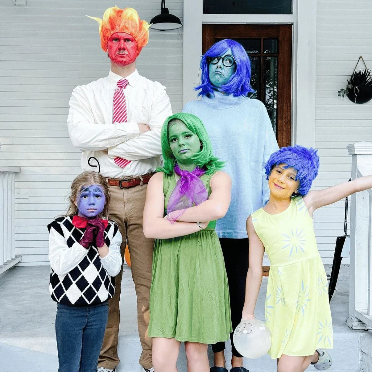 Family of 5 dressed as joy, anger, sadness, disgust and fear