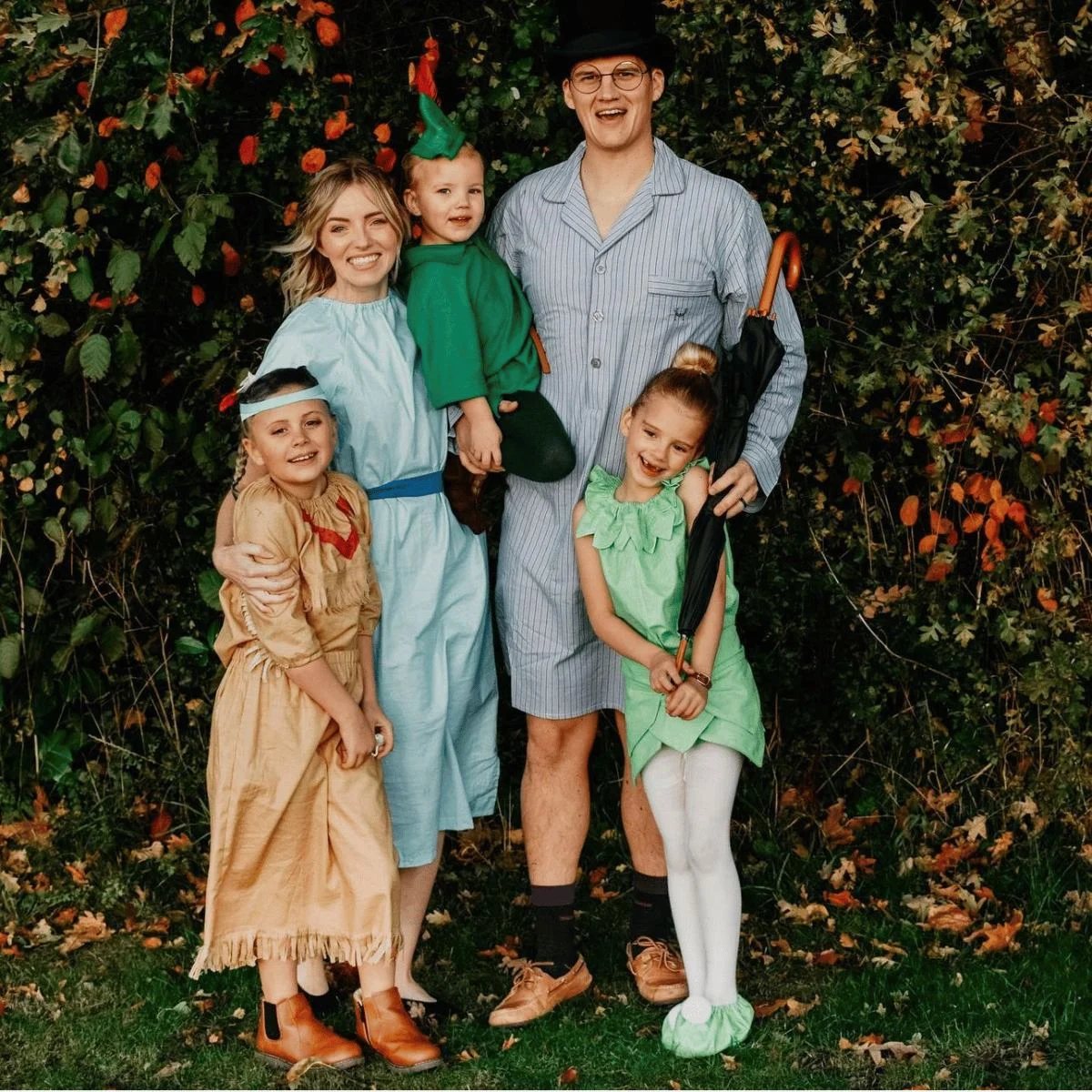 Family of 5 dressed as Peter Pan, Wendy, Captain Hook and other characters